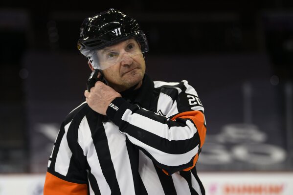 Nhl player hits ref on sale